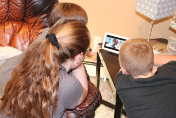 Google Home Hub from Verizon kids watching