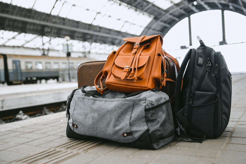 Stylish Travel Essentials: Jeans, Bags, and More